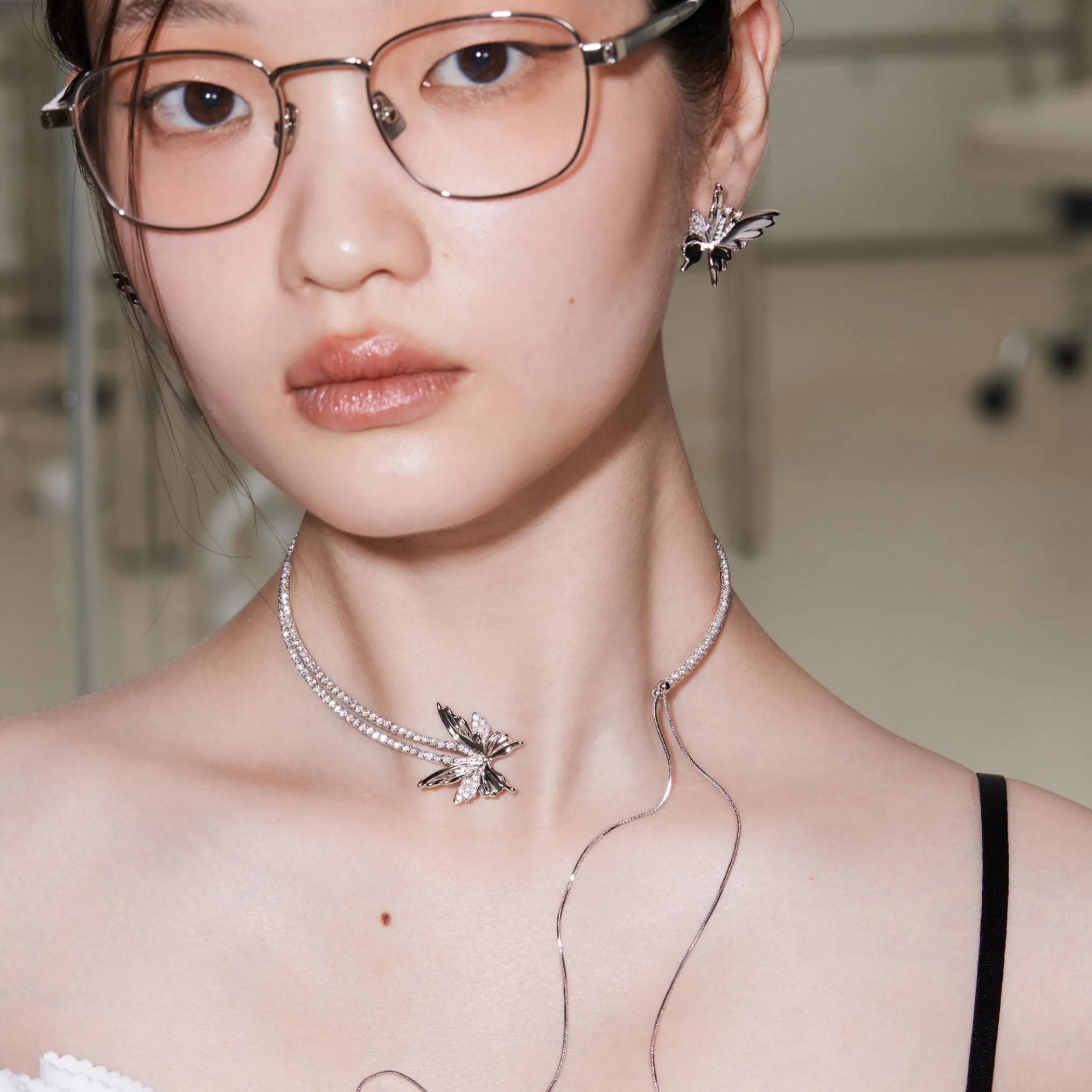 Ripple / Butterfly Zircon Long Tassel Chocker