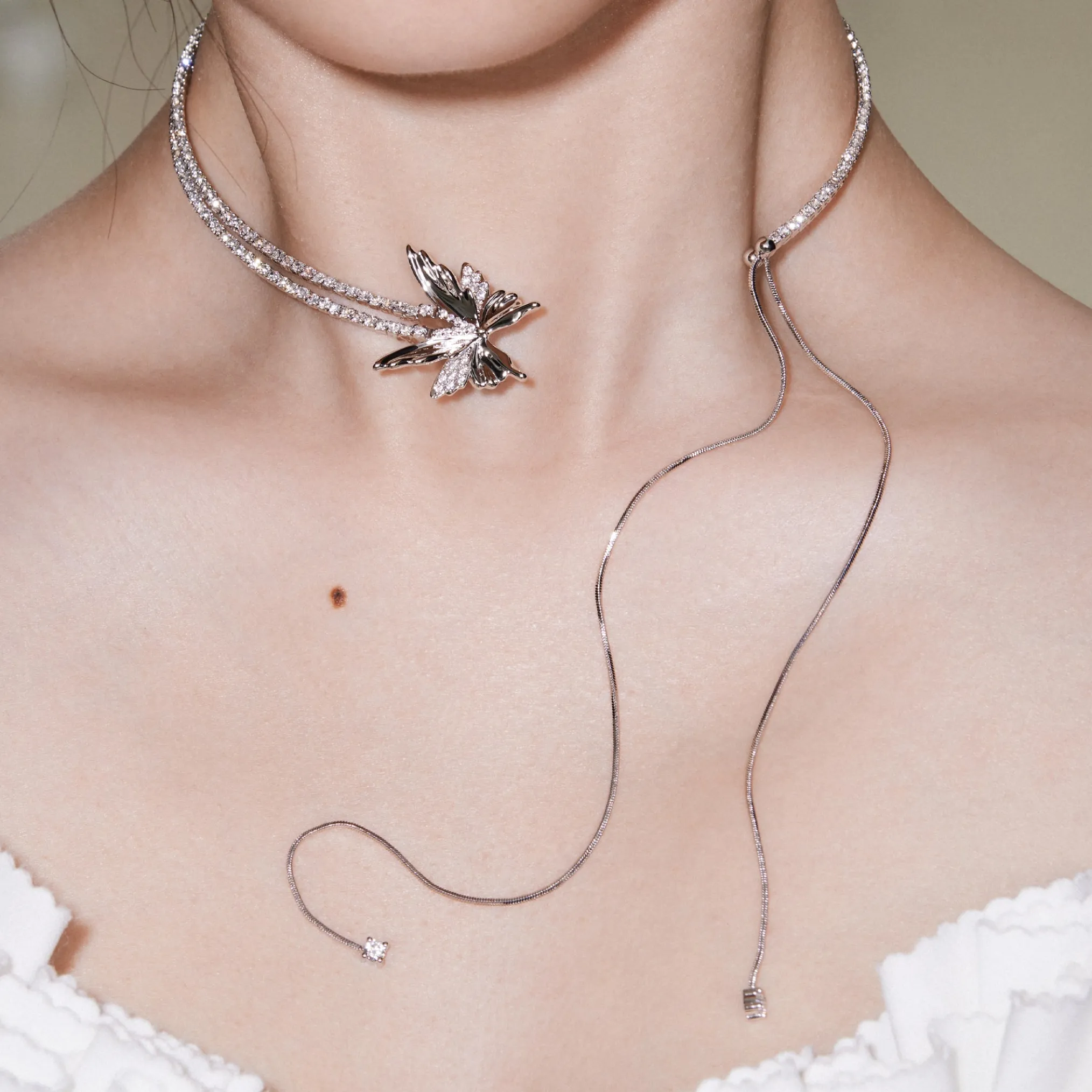 Ripple / Butterfly Zircon Long Tassel Chocker