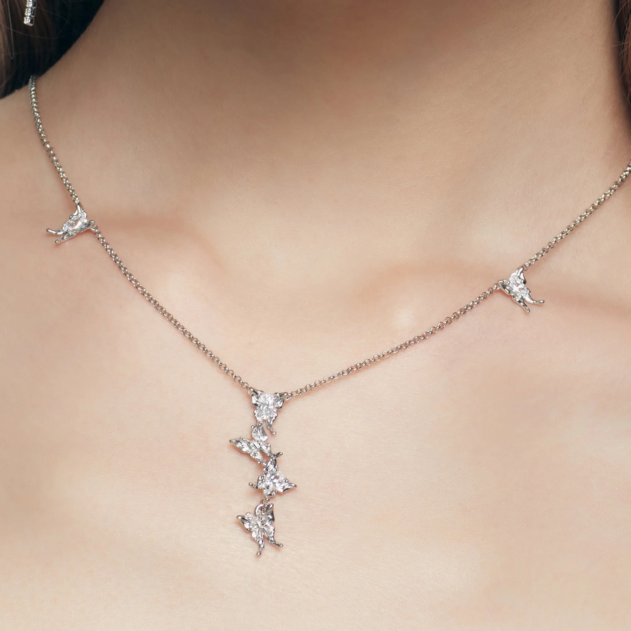 Ripple / Liquefied Mini Butterfly Silver Necklace
